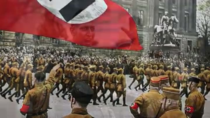 A massive Nazi parade, illustrating the public display of power and control.