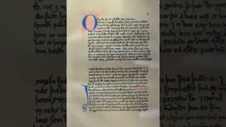 Ancient manuscript pages showcasing the historical sagas detailing Viking voyages and encounters.