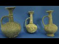 Ancient vessels likely used for storing or trading potent substances.
